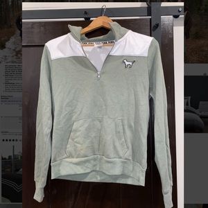 green sweater from pink